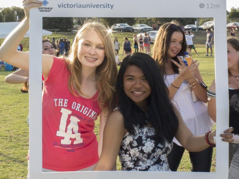 three women posing for an instagram picture at VU open day