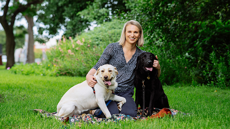 Beth with her two young labradors