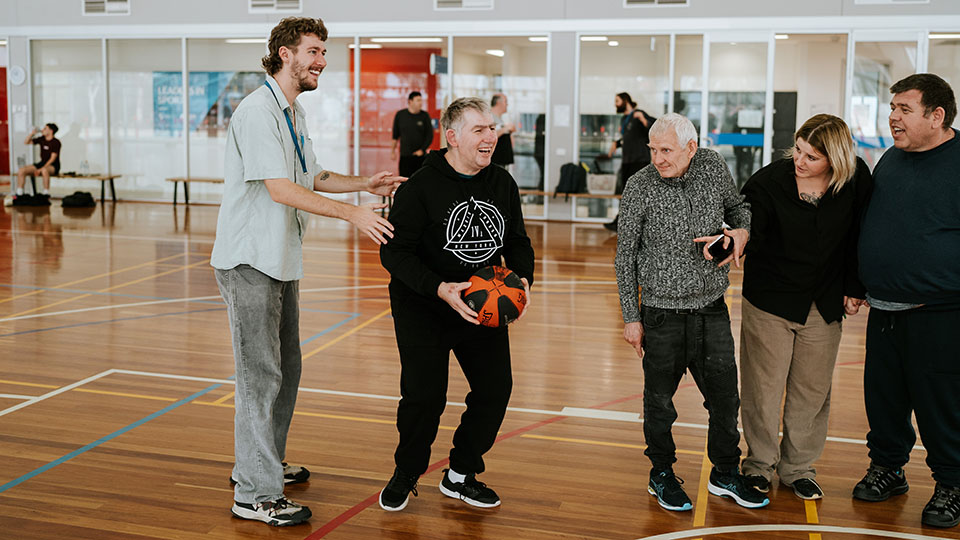 People playing basketball together.