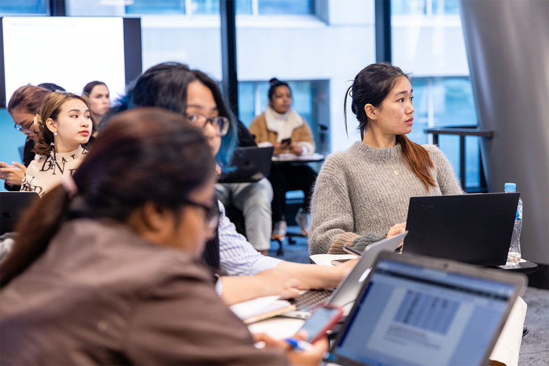 Students learning in class at VU City Tower.