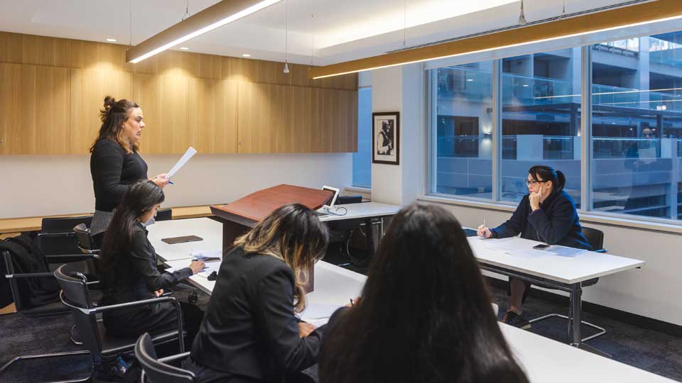 Jaspreet Kaur presenting to barrister judge Bonnie Renou