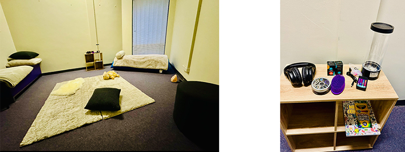 Room with a mat, bed and shelf with colouring and activities