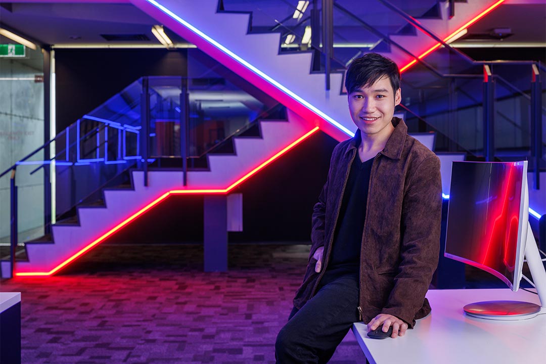 Student in front of computer at VU's cyber security facility at St Alban's.