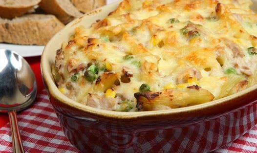 photo of a veggie pasta bake, with a spoon on the side