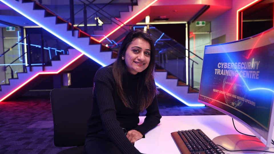 A VU cyber security sits in front of a computer at the Cyber Security Training Centre in St Albans.