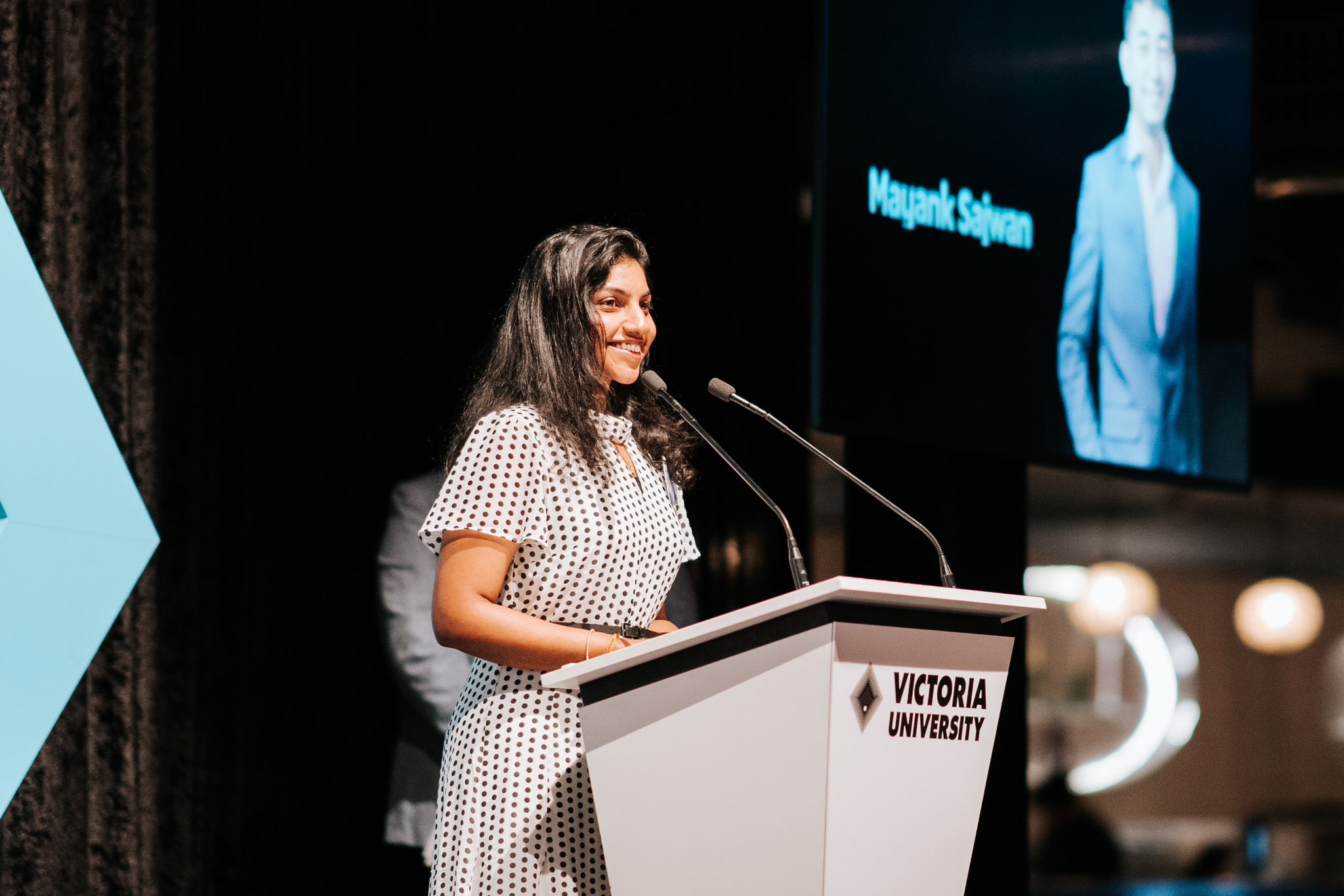 Adsheaya Vasakan speaking on stage at a VU event