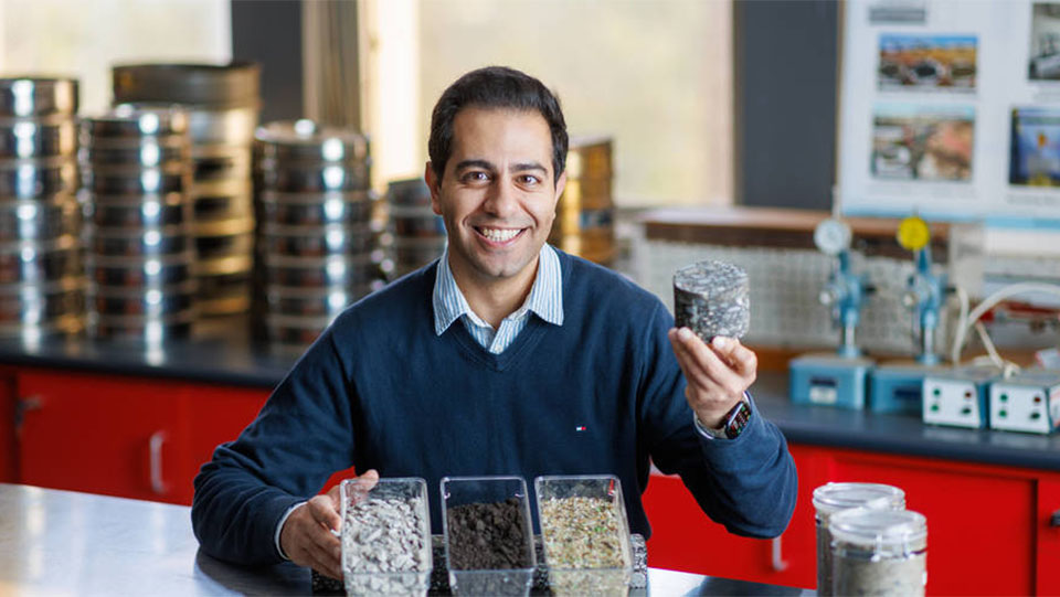 Ehsan Yaghoubi holding up sample.