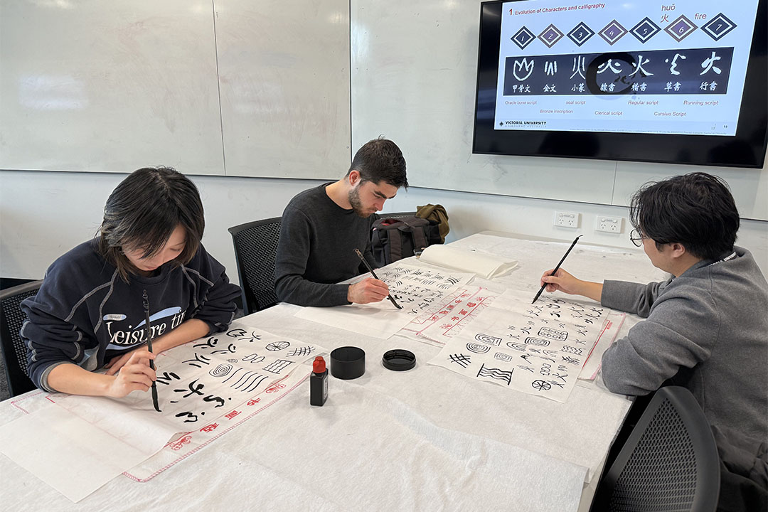 VU students learning Chinese characters