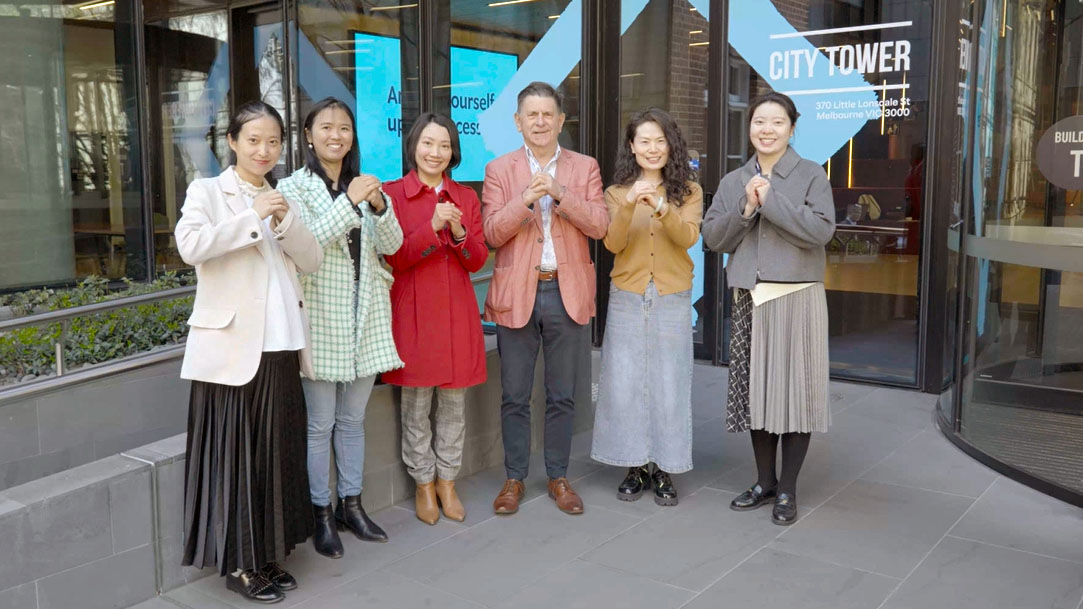 Staff from VBCI at Victoria University standing outside City Tower.