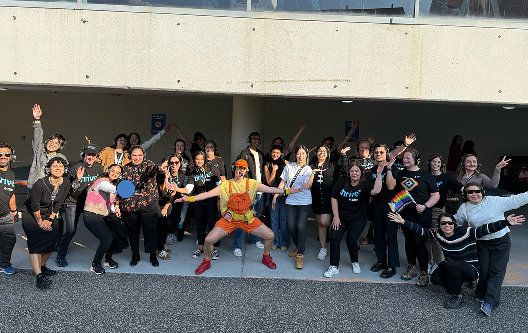 Group of staff posing at the Silent Disco *thrive event