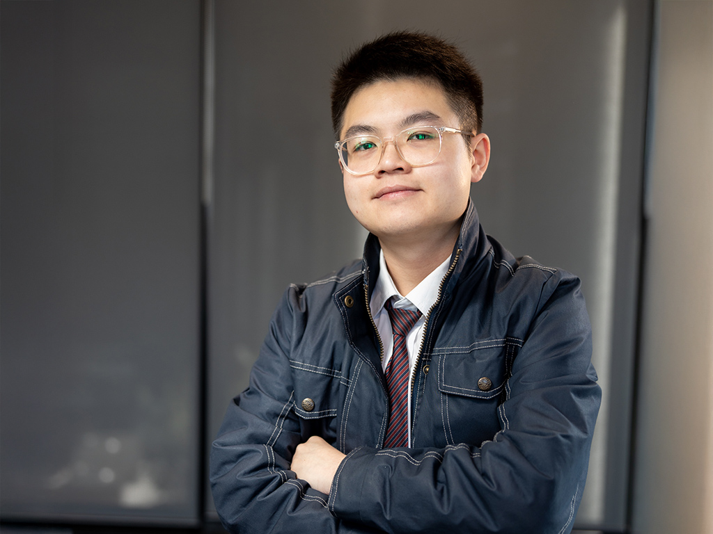 A young man poses for the camera 