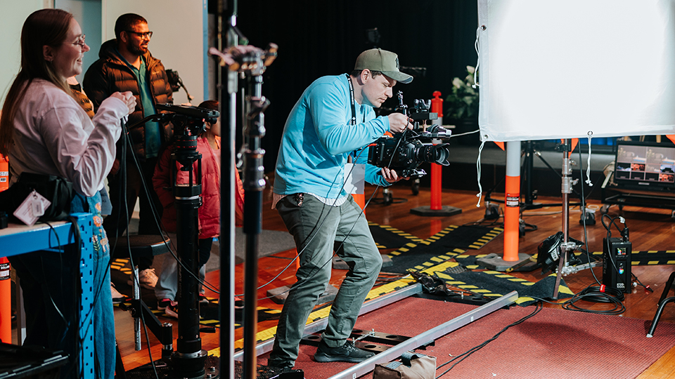 VU staff filming in the TV studio on Footscray Park campus