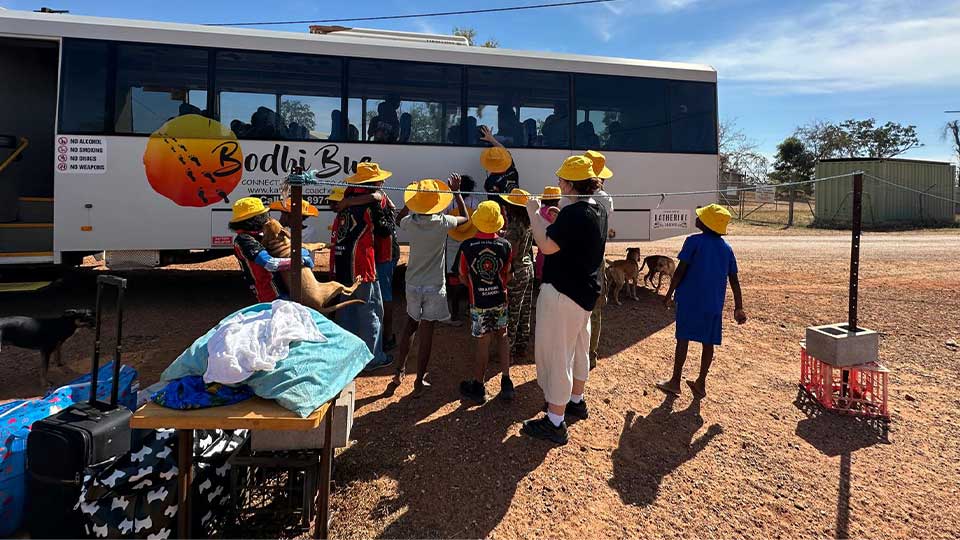 A group of SWiRL school students greeting the bus in Urapunga a remote community in the NT