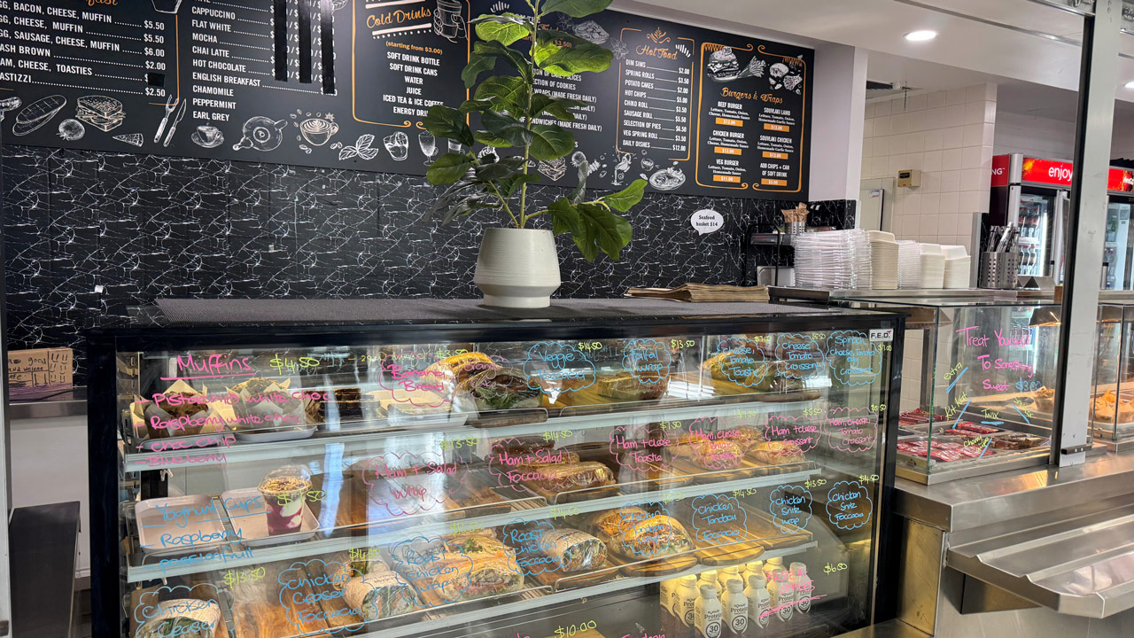 A bright cafe display showing ready-made lunch options
