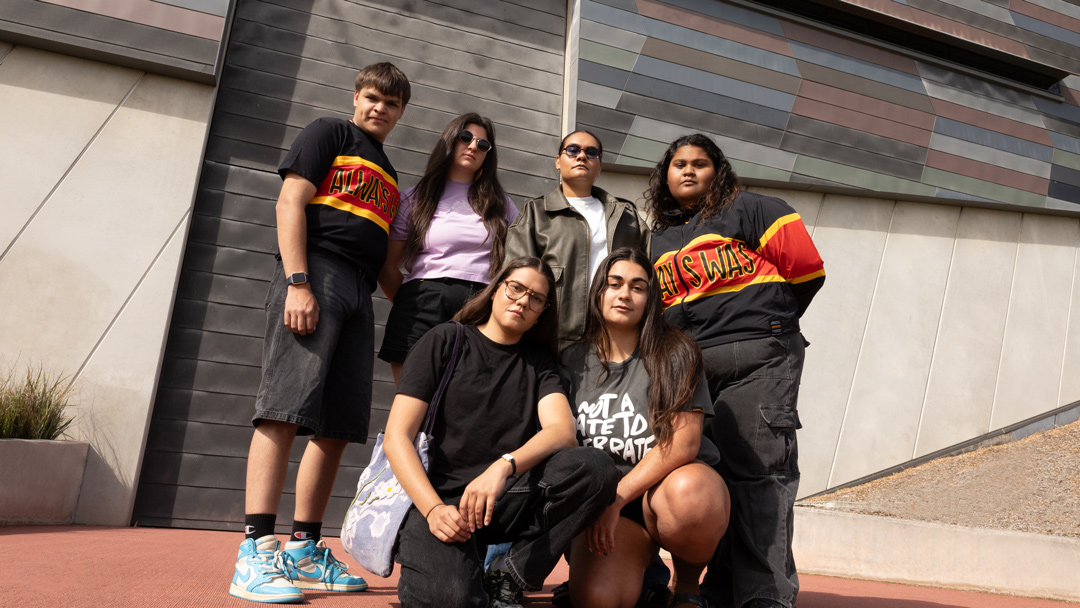 Group of Aboriginal and Torres Strait Islander students outside the in sunshine.