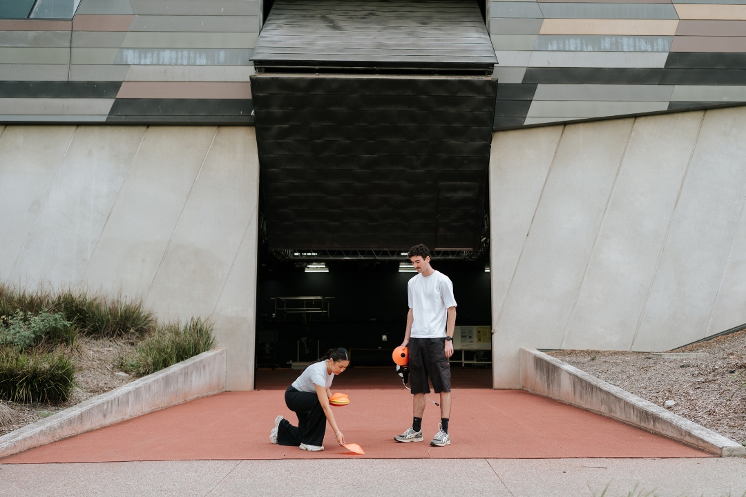 Students placing cones outside biomechanics lab