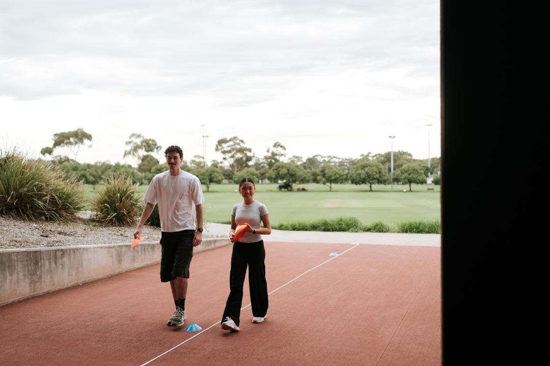 Students walking into biomechanics lab from outside