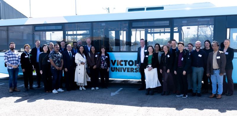 Group in front of VU bus