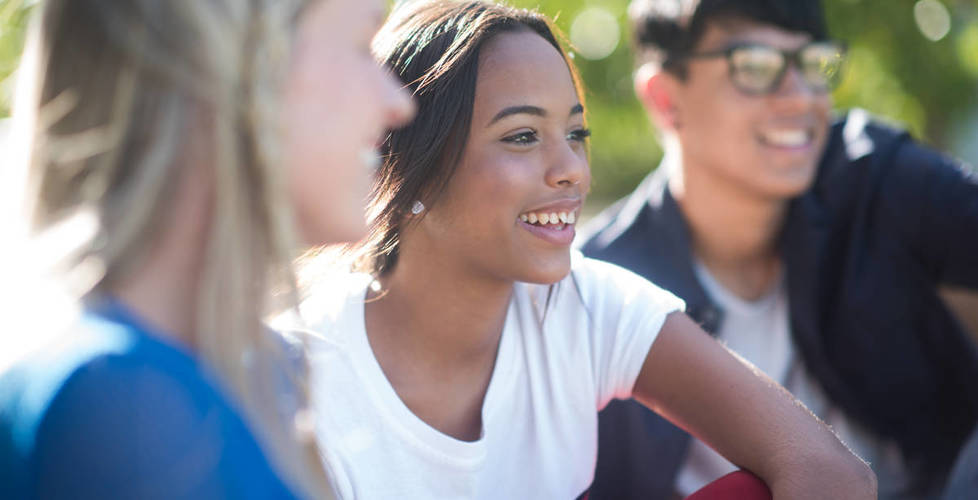 Three students from three different backgrounds