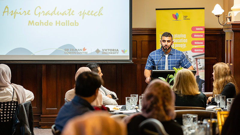 Mahde Hallab making a speech as part of the Aspire program.