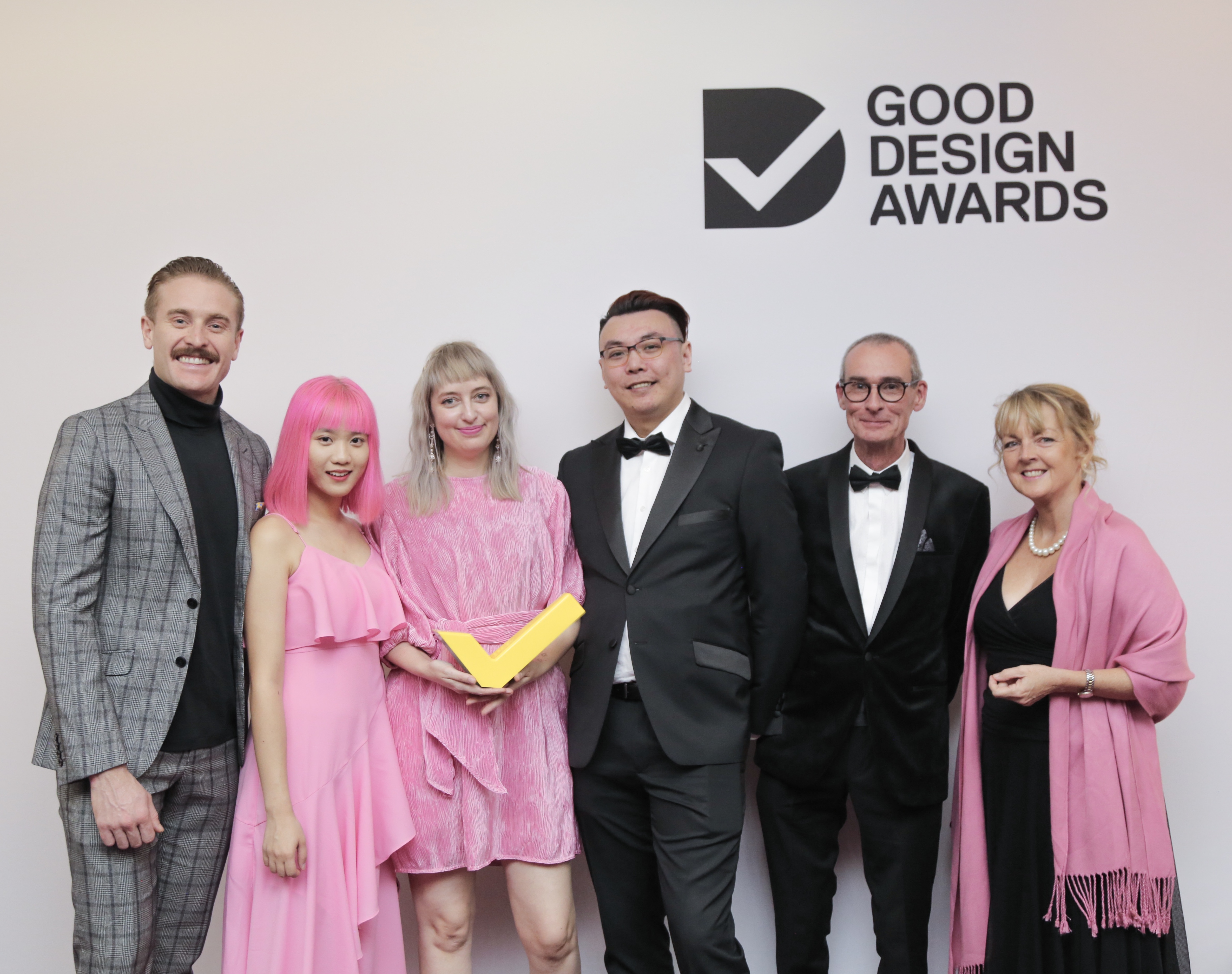  VU App team holding the Good Design Awards Gold Trophy