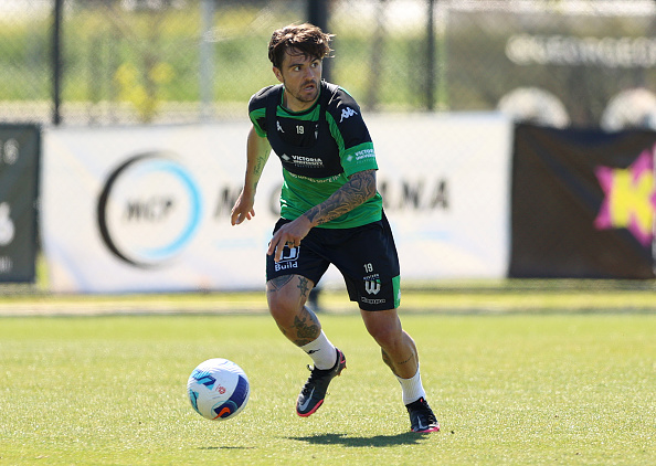 Josh risdon running towards a ball