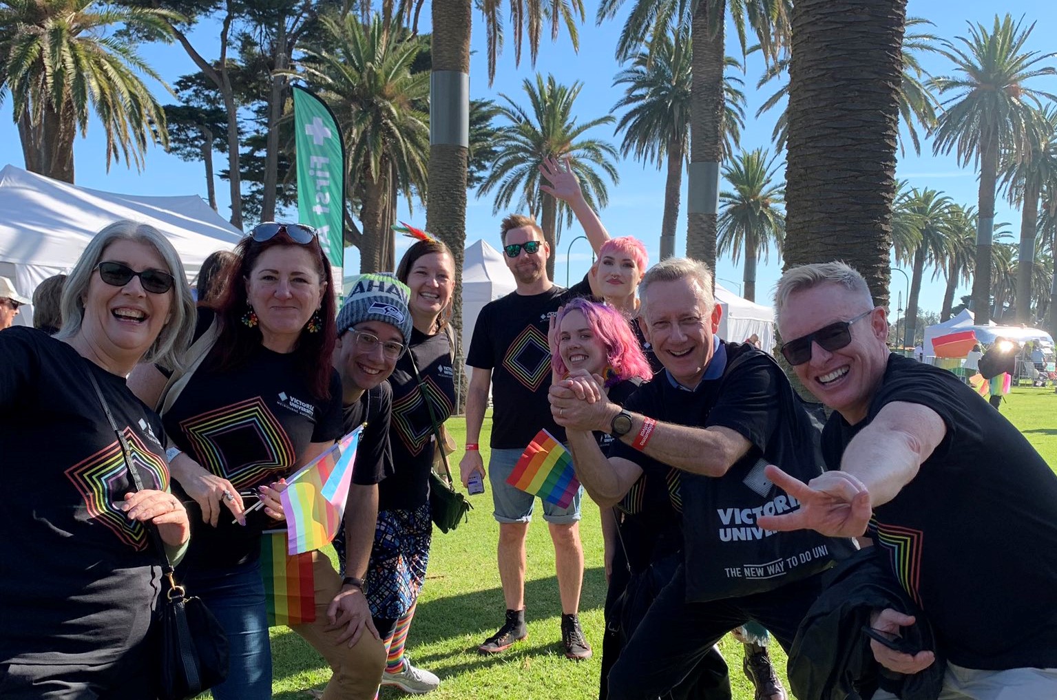 Smiling staff and students posing at VU's first ever Pride March