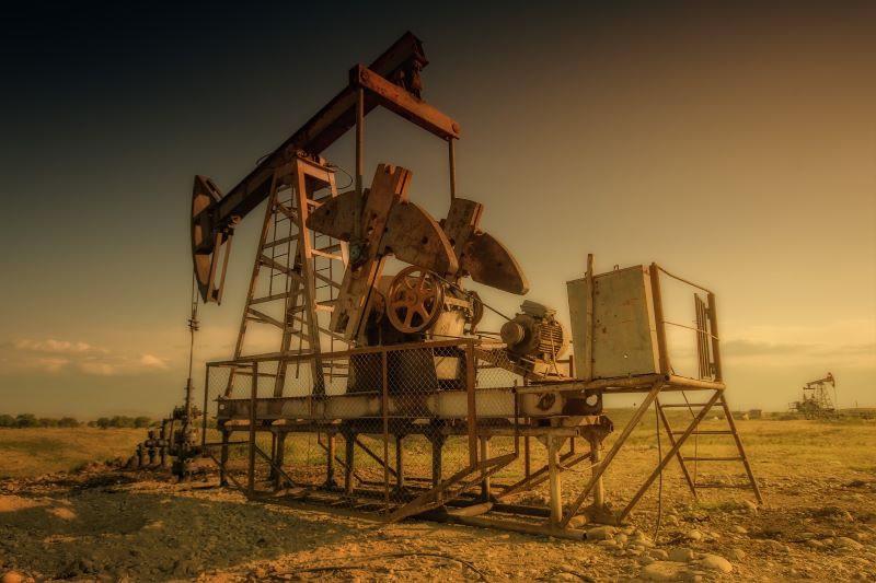 Oil derrick in field