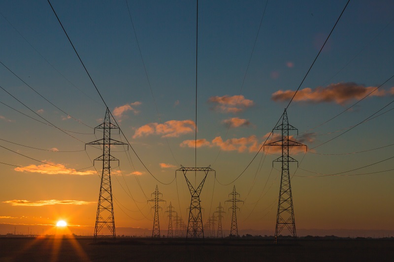 sunset behind powerlines