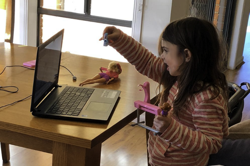  Five-year-old Sadie shows her dolls during Phoebe's virtual placement