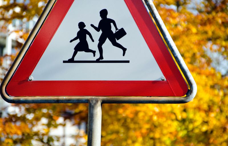School crossing triangular sign