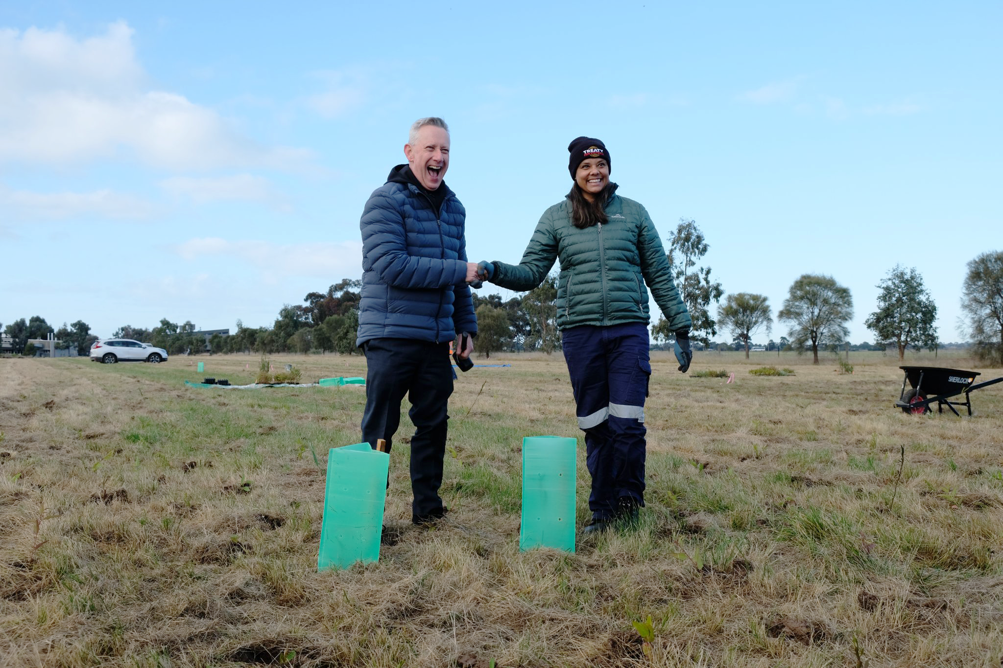Vice Chancellor Professor Adam Shoemaker and VU Student Tahnee Towers plant the first tree.