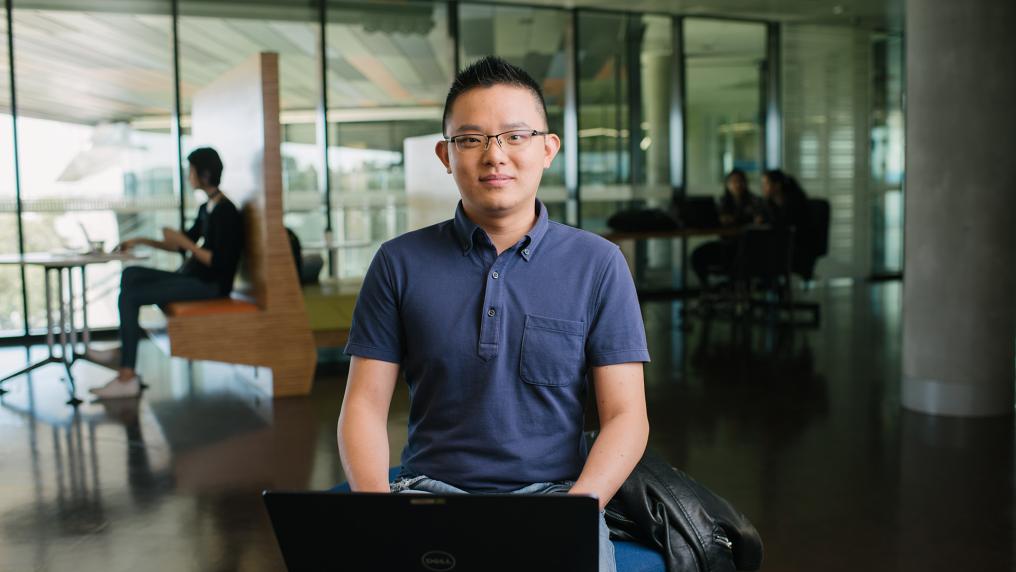 VU information technology student working at a computer.