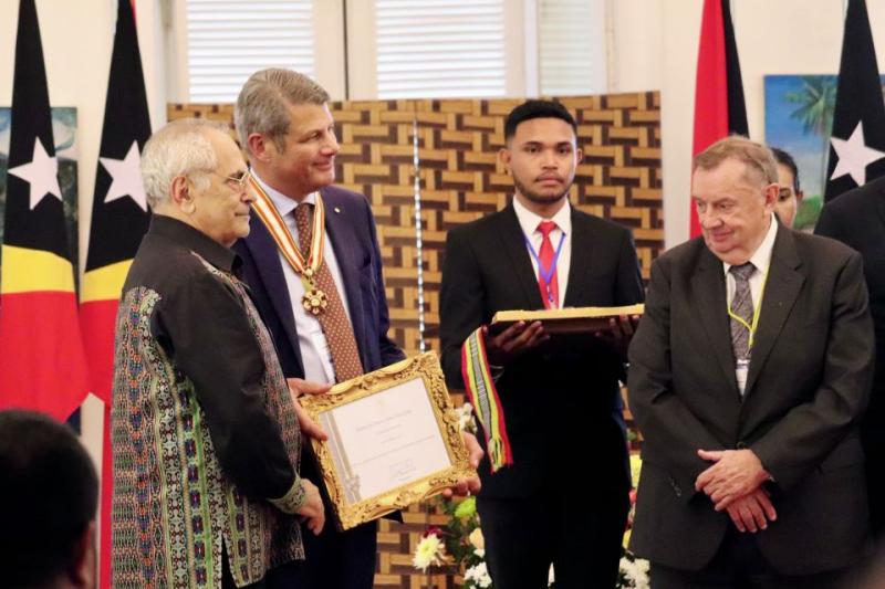 Steve-Bracks-and-Harold-Mitchell-receive-award-from-Timorese-Government