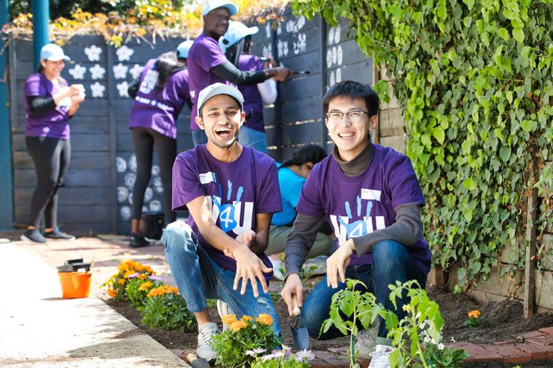 Students volunteering in the garden.