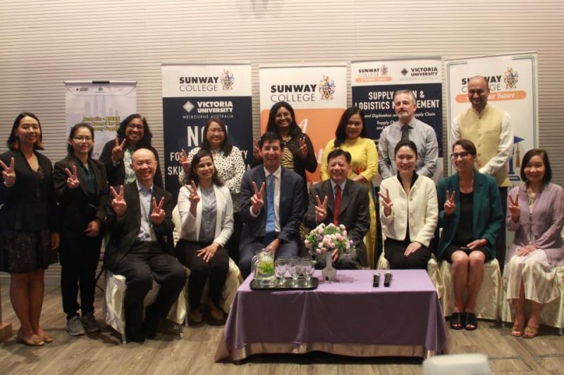 Group shot with conference attendees.