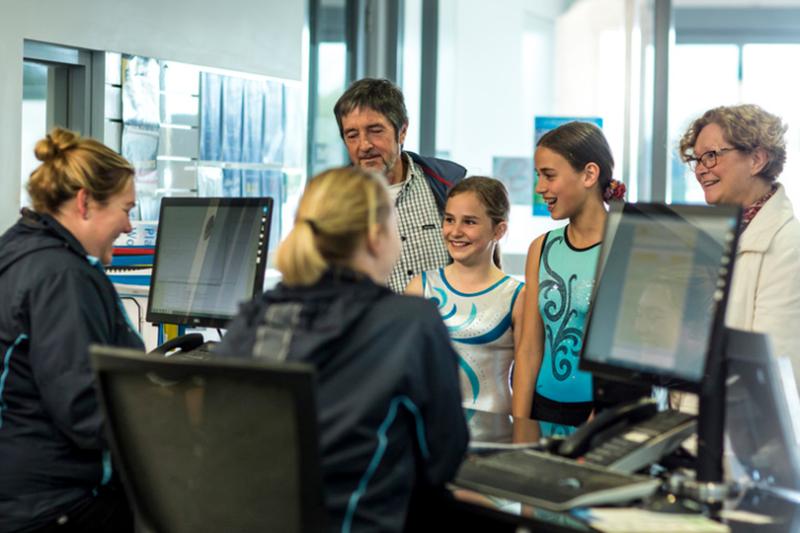 The team at Gymnastics Victoria welcoming young gymnasts to club.