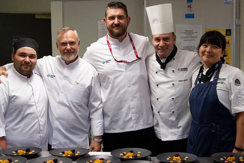Markus Werner with VUP students at Victoria University (VU) Polytechnic Charity Dinner