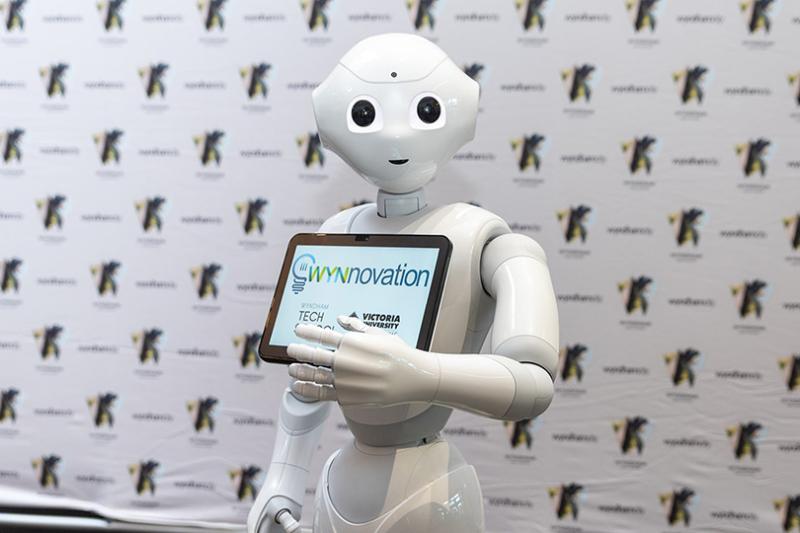 Pepper the robot greeting attendees at WYNnovation Festival.