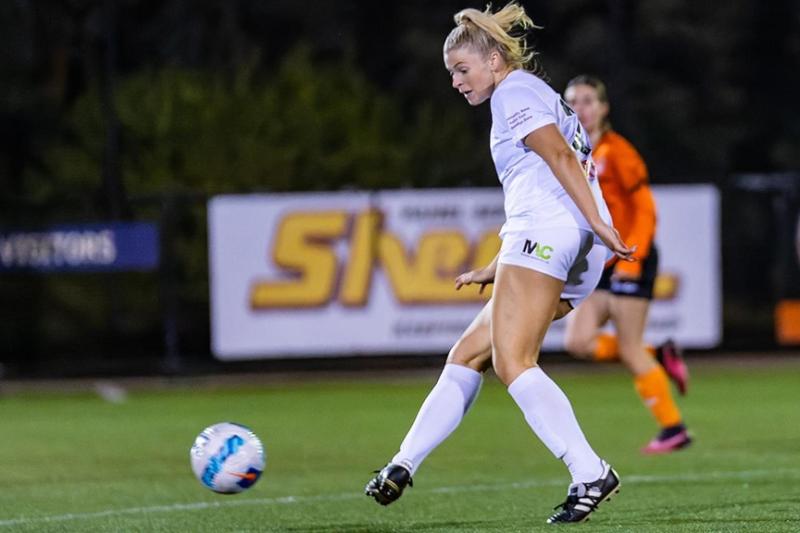 Woman playing soccer
