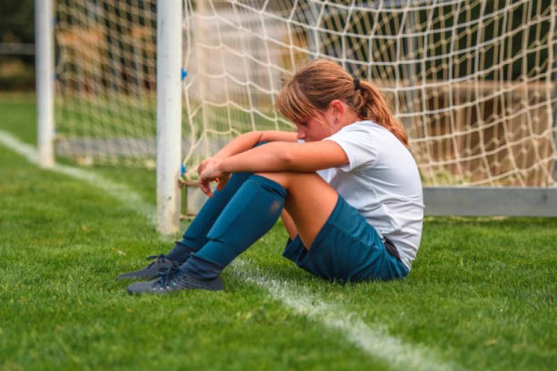 Sad child playing sport