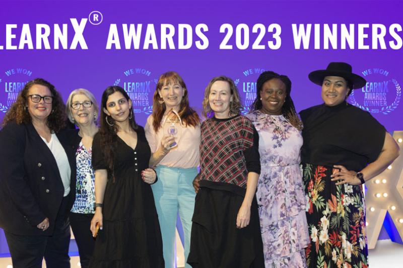 Rhian Thomas, Marian Cronin, Shiva Foroutan, Heather Marsh, Vanessa Barnes, Abiola Akinbiyi, Lani Evalu on stage at LearnX 2023 awards.
