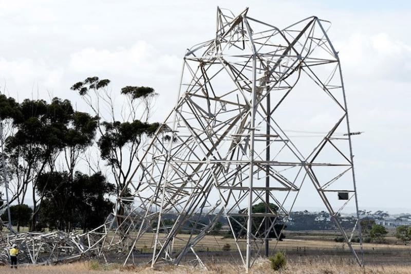 A collapsed transmission tower in Victoria, damaged by storms.