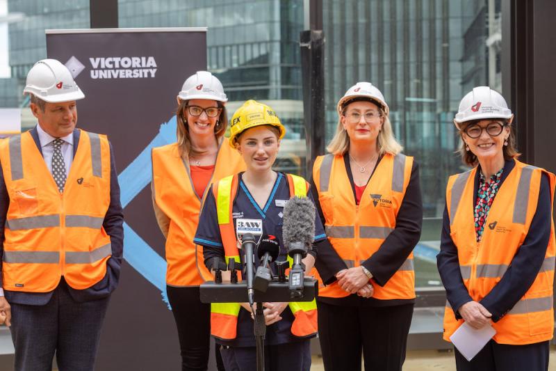 People standing at a press conference at Footscray Hospital construction site