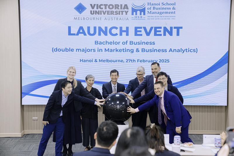 Group of people at Hanoi Business School at the launch of partnership with Victoria University.