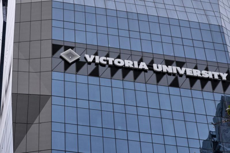 A photo of VU City Tower - featuring the Victoria University logo