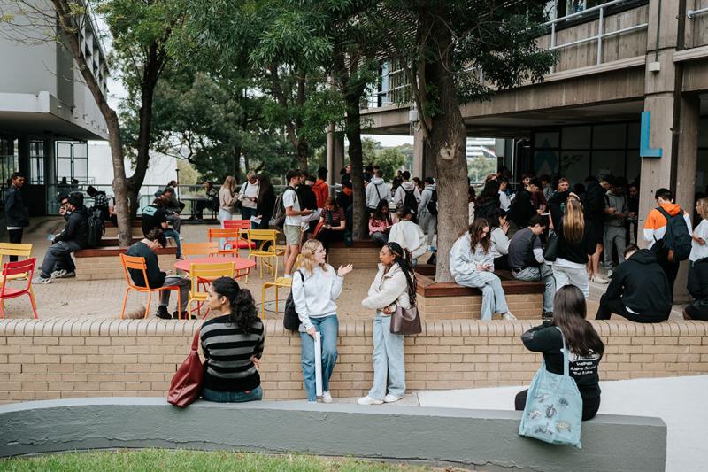 Students hanging around Footscray Park campus during OFest