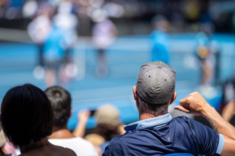 A crowd watches tennis at the Australian Open