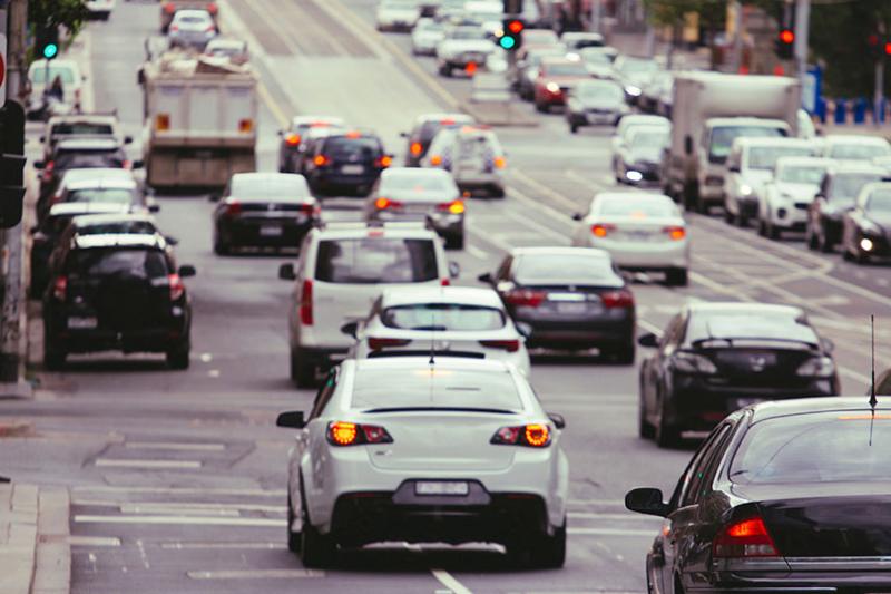 Cars in heavy traffic, on the road