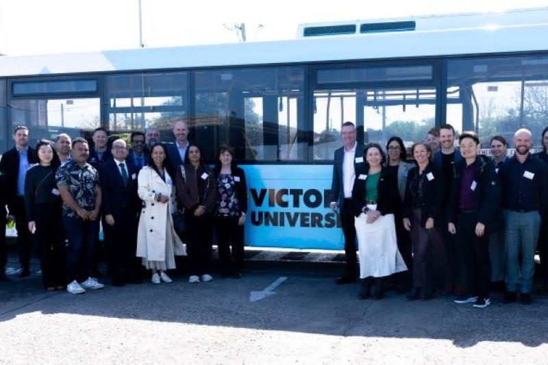 Group in front of VU bus